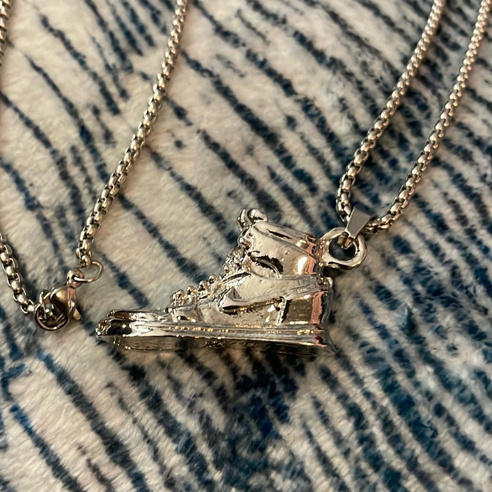 Brand new silver Nike air forces necklace